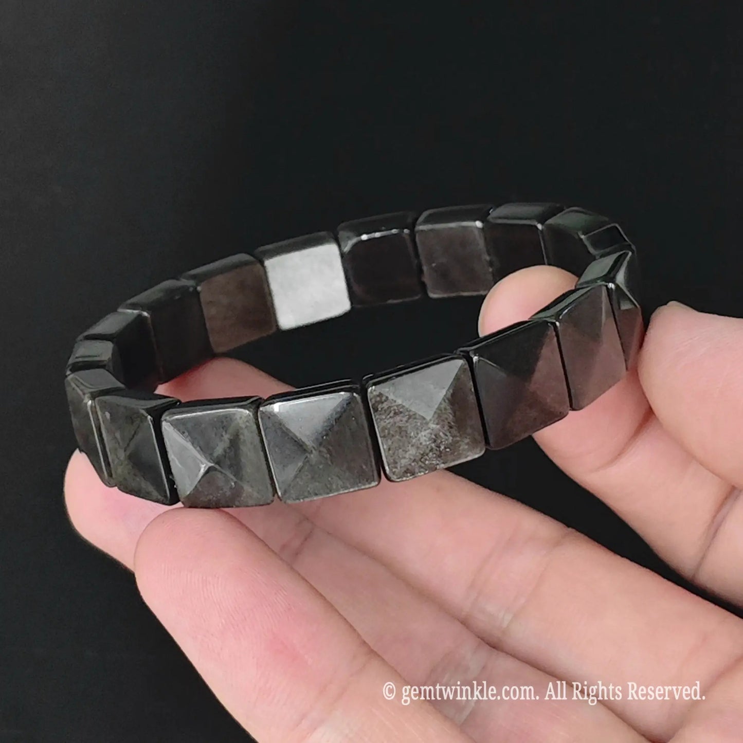 Overview of silver sheen obsidian geometric pyramid cut 11mm square bead bracelet showcasing smooth faceted edges