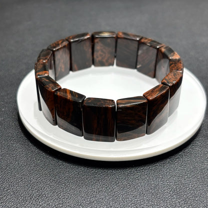 Single Natural Mahogany Obsidian Bangle Bracelet on White Plate, Rectangular Bead Design, 18.5cm Length, Meditation Tool