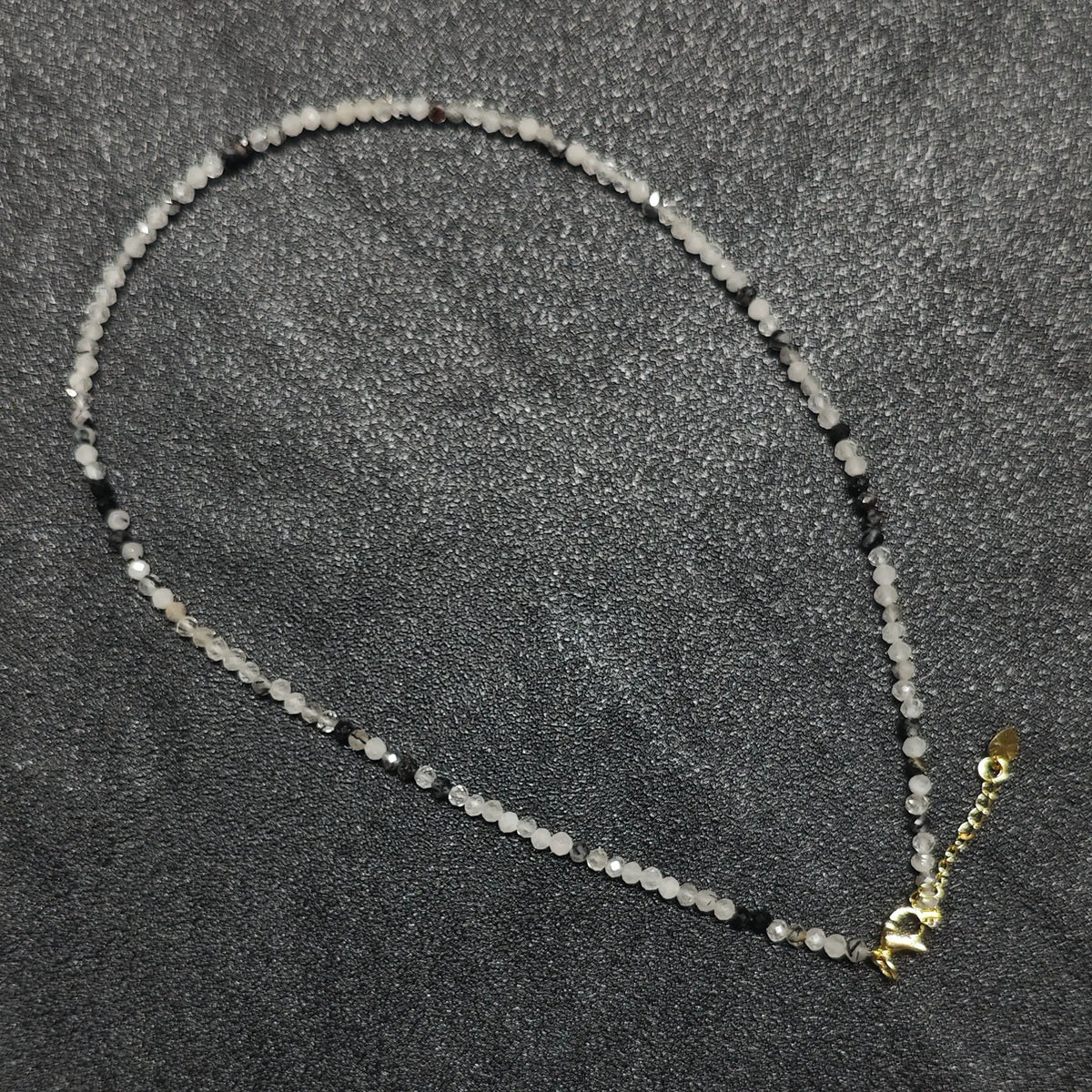 Smoky black rutilated quartz gemstone collar necklace featuring 3mm micro faceted beads and gold extension chain