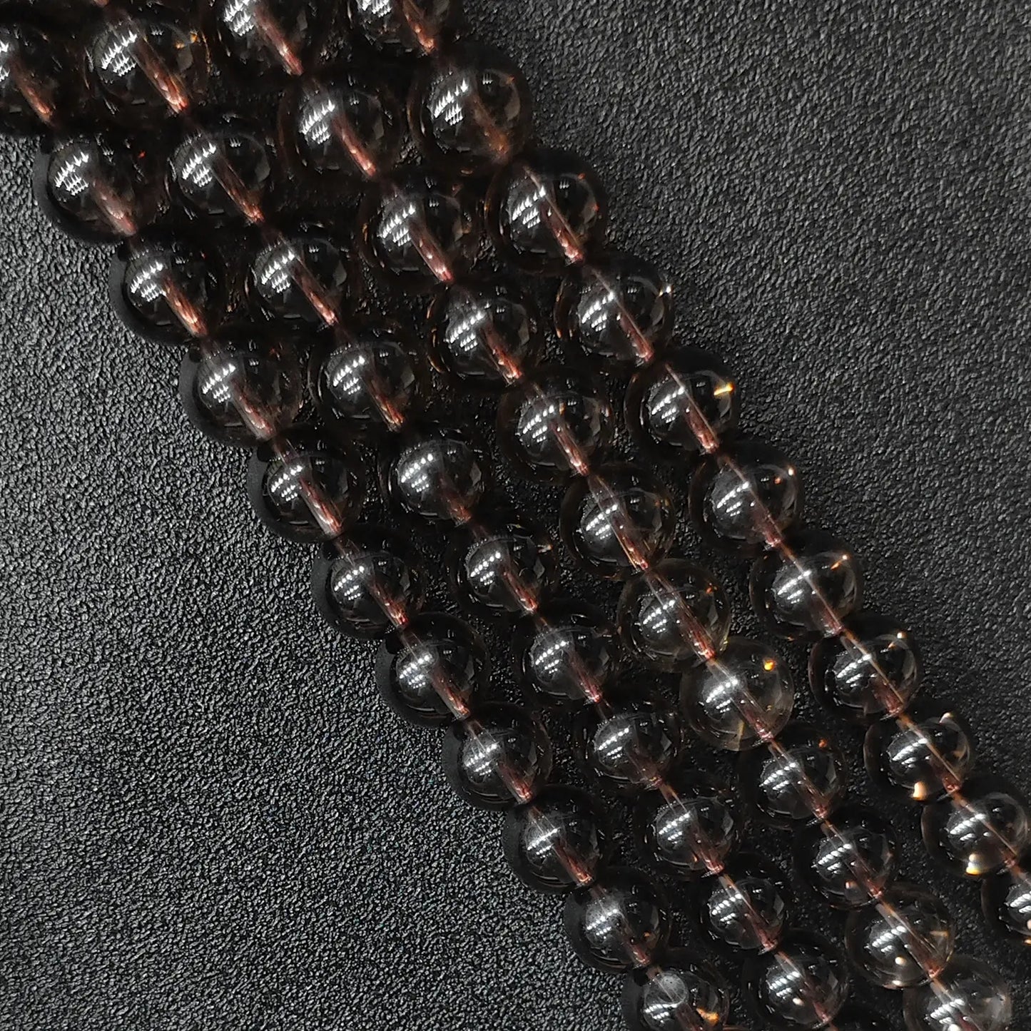 A grade smoky quartz round loose beads with flawless clarity and intense brown tones gems twinkle stock