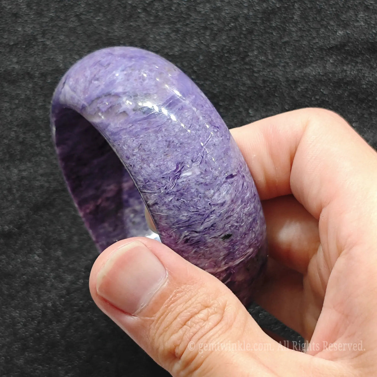 inner rim and thickness detail of polished natural charoite cuff