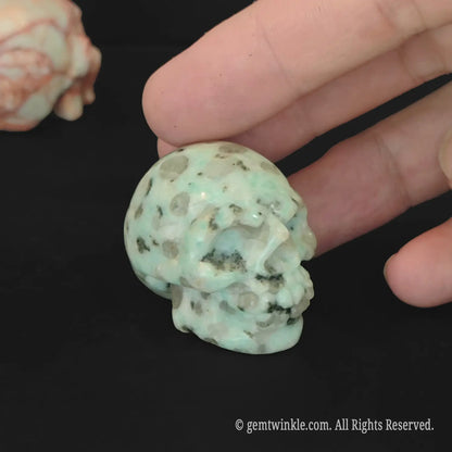 natural spotted stone skull figurine