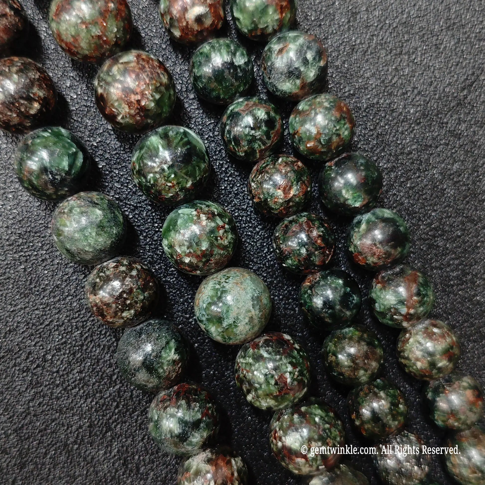 Resin stabilized clinochlore mineral bead bulk lots from our direct market sourcing networks