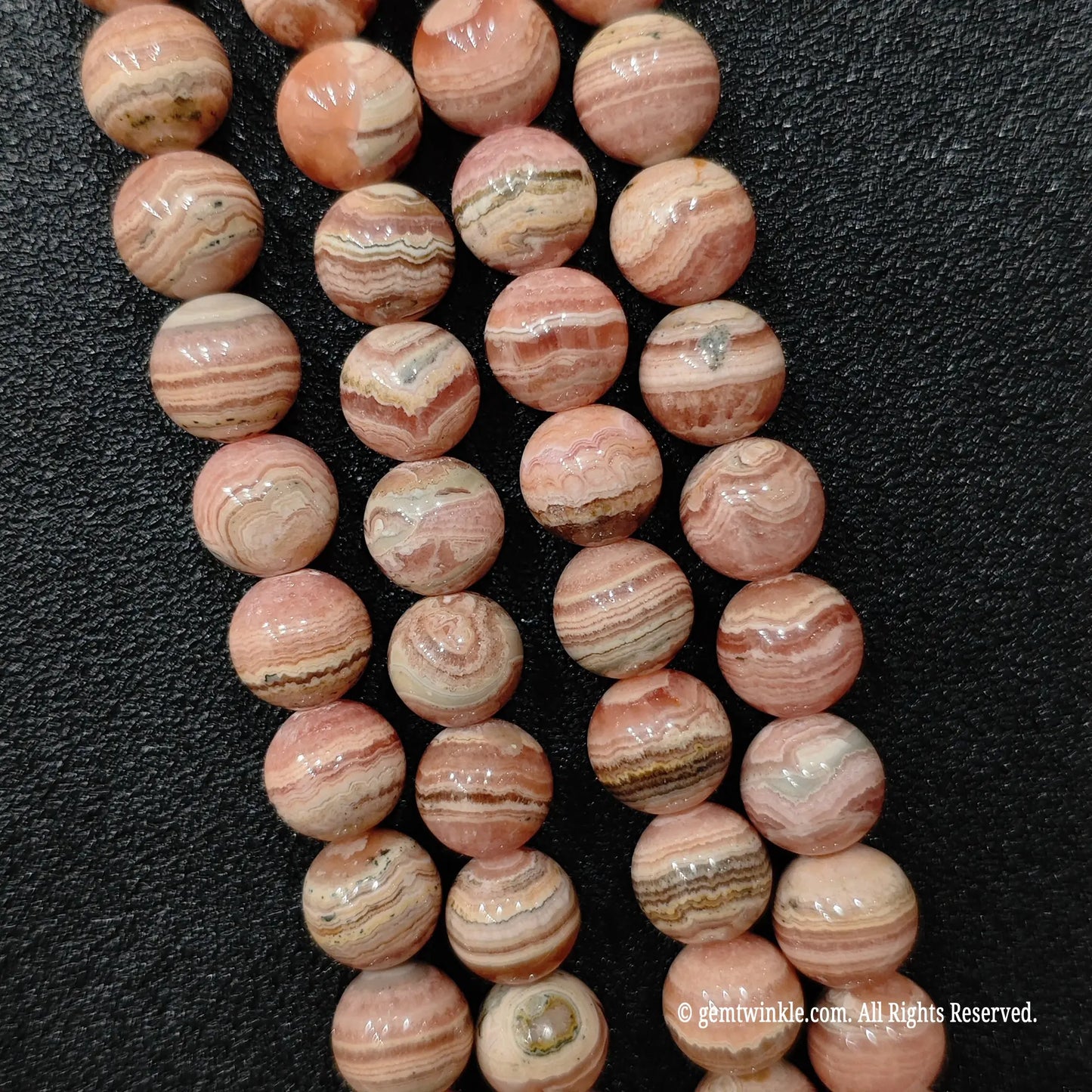 Resin stabilized natural rhodochrosite round mineral bead strands from donghai crystal wholesale market stock