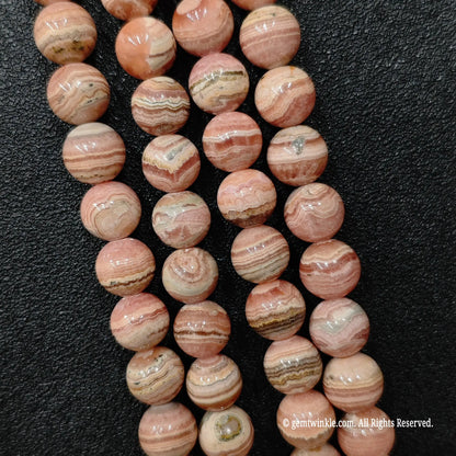 Resin stabilized natural rhodochrosite round mineral bead strands from donghai crystal wholesale market stock