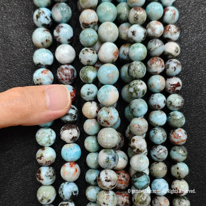 Resin stabilized natural larimar loose crystal bead strands close up display for small shops