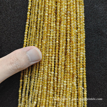 Bulk wholesale strands of B grade 3mm small round gold rutilated quartz loose beads with thick hair strands perfect for delicate stacking bracelets and fine jewelry making