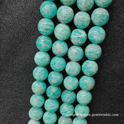 Vertical view of natural Grade B amazonite statement gemstone bead strands showing seafoam green tones