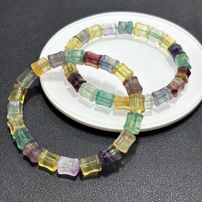 Top-down view of a fluorite bamboo bead bangle, emphasizing the geometric shape and the stretch elastic design for easy wear.