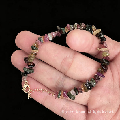 detail view of lobster clasp and extender chain on multi color tourmaline bracelet