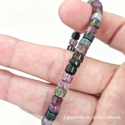Side view of natural tourmaline stretch bracelet showing bead profile and comfortable stretch fit