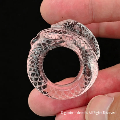 Side view preview of clear quartz serpent ring highlighting carved crystal scales and polished finish