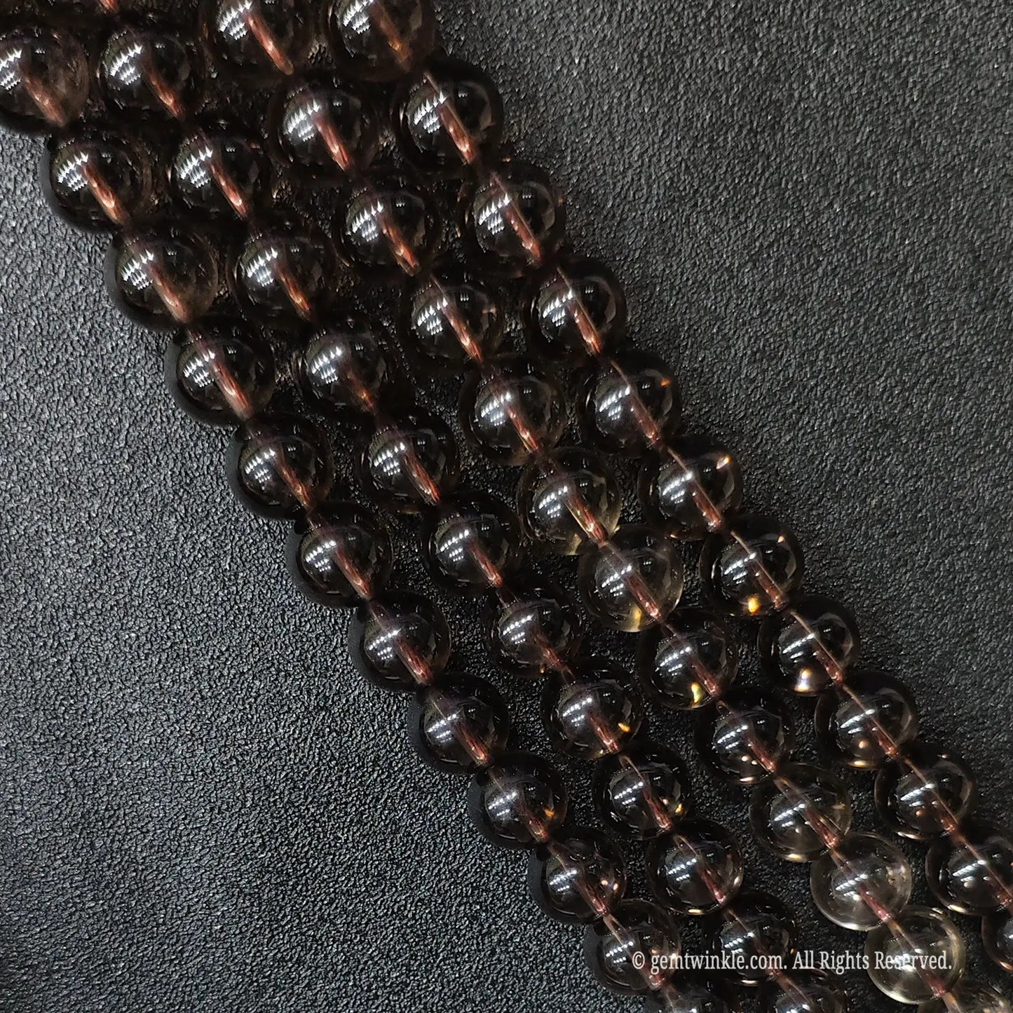 Premium transparent smoky quartz crystal round strands available from 3mm to 20mm with no inclusions