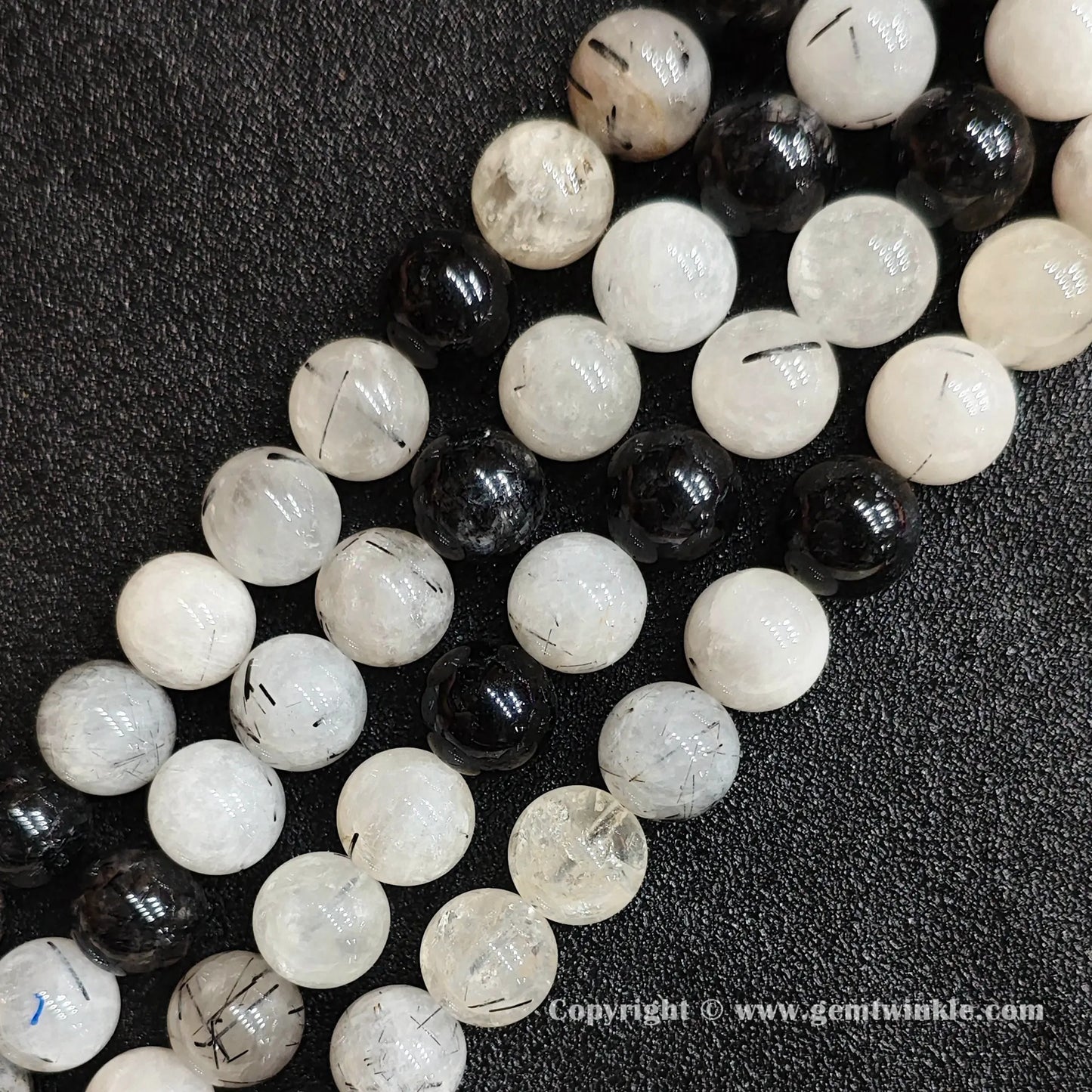 Four strands of un-dyed genuine C grade black rutilated quartz gemstone beads displaying rich needle inclusions from factory supplier