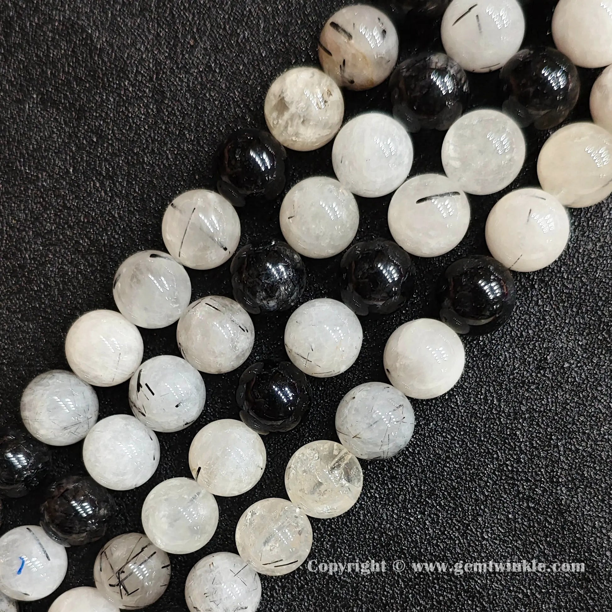 Four strands of un-dyed genuine C grade black rutilated quartz gemstone beads displaying rich needle inclusions from factory supplier