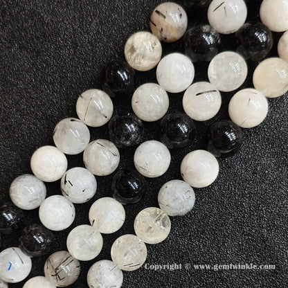 Four strands of un-dyed genuine C grade black rutilated quartz gemstone beads displaying rich needle inclusions from factory supplier