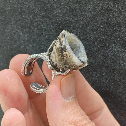 Unique gift shop jewelry agate geode ring showcasing the textured multi strand adjustable alloy ring band and stone underside
