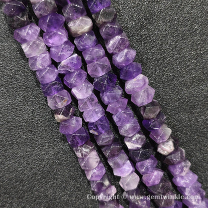 Vertical alignment of violet amethyst prismatic cylinder column beads on dark surface