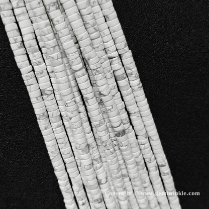Multiple strands of natural white howlite disc rondelle beads laid together for bulk preview