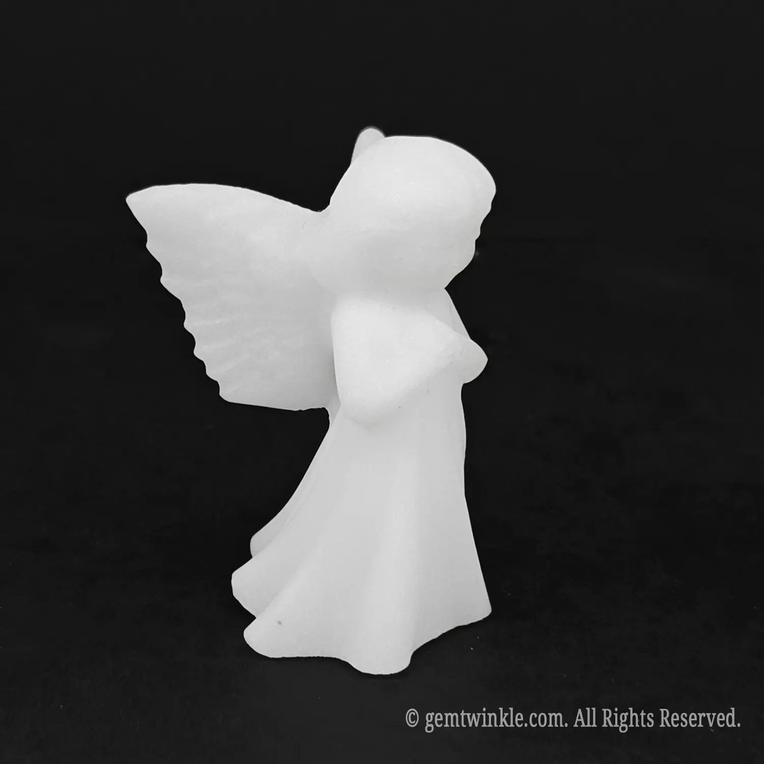 Back view of a white marble angel figurine highlighting the beautifully hand sculpted feathered wings detail