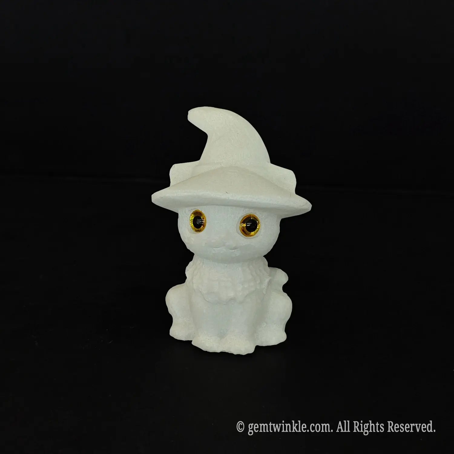 A standalone front view of a white marble witch cat sculpture highlighting the detailed ruffle collar and glossy golden eyes