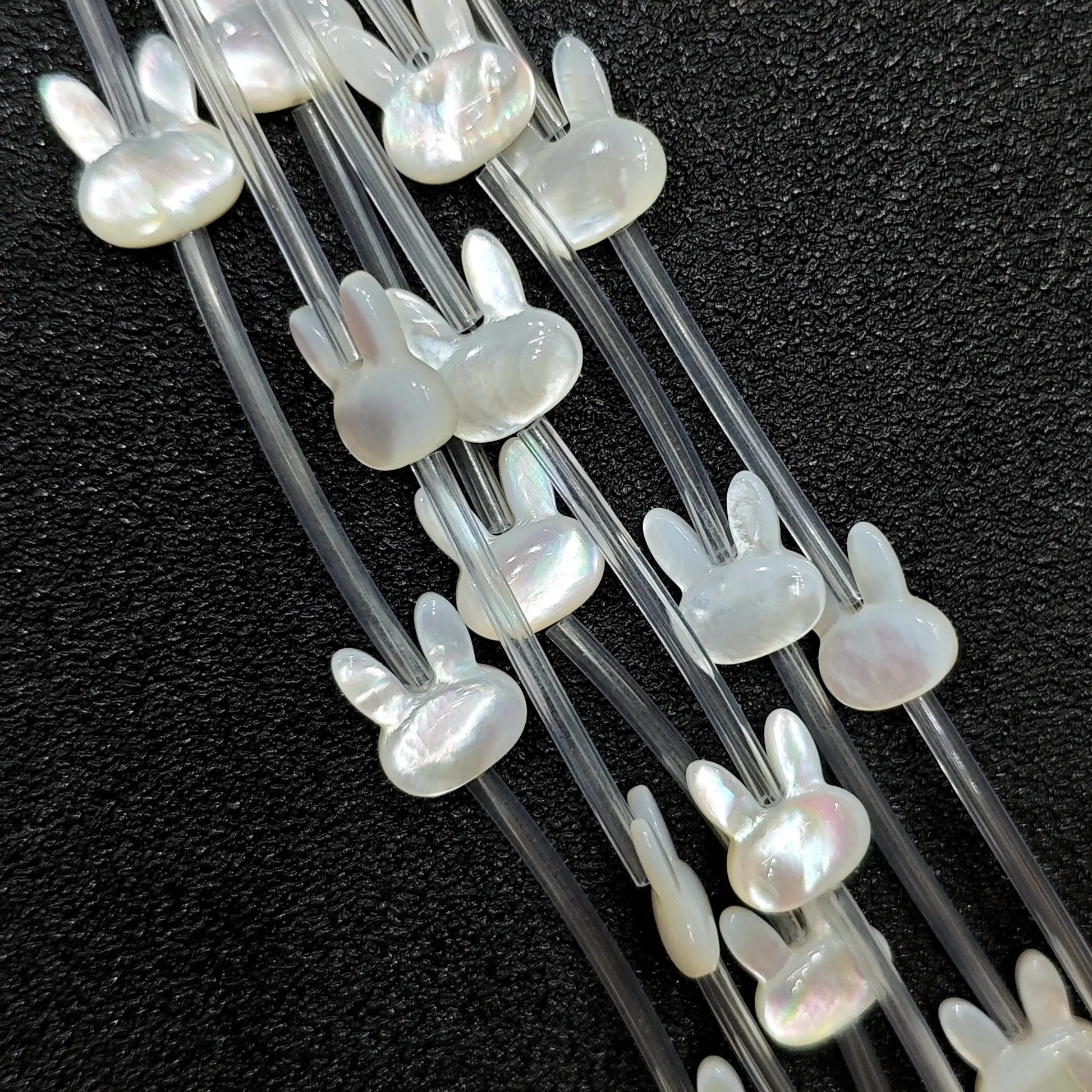 White mother of pearl bunny head carved loose beads full strand