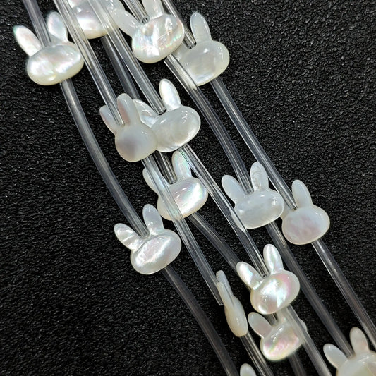 White mother of pearl bunny head carved loose beads full strand