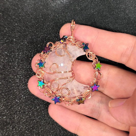 Copper-tone wire wrapped clear quartz crescent moon pendant with colorful star beads front preview