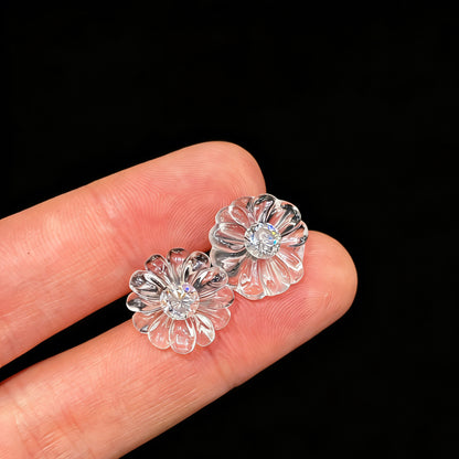 Close Up of White Quartz Flower Stud Earrings on Black Background