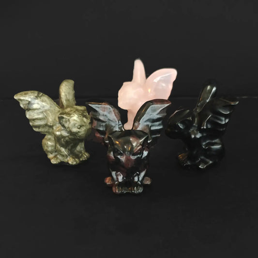 Wholesale natural crystal gargoyle statues carved from pyrite black obsidian red spotted stone and rose quartz