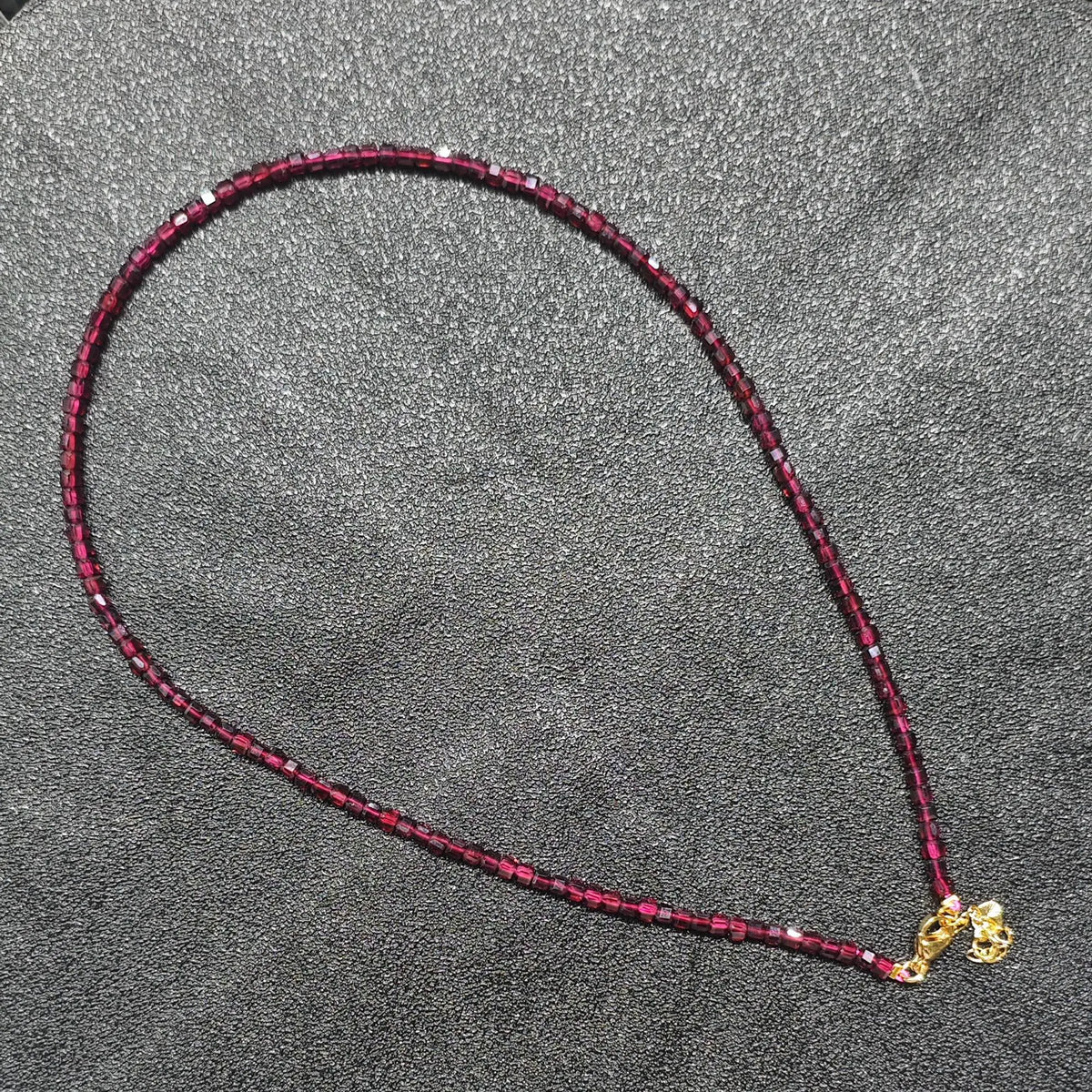 Wholesale Red Garnet gemstone necklace featuring 3mm square cube beads and gold extension chain