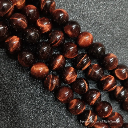 Red tiger eye loose round beads strands in multiple calibrated sizes for boutique sourcing