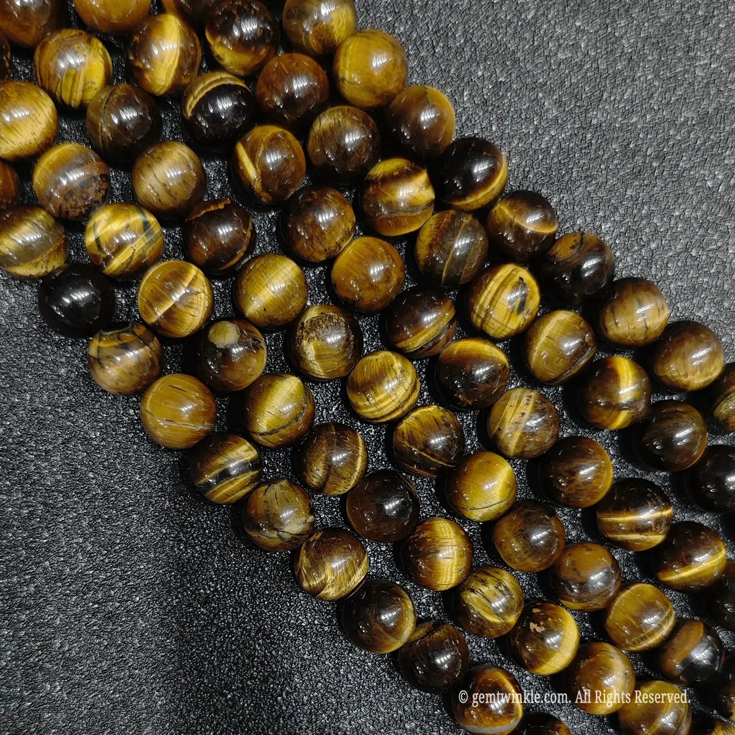 High angle view of wholesale earthy natural grade b minus tiger eye beads for rustic jewelry designers