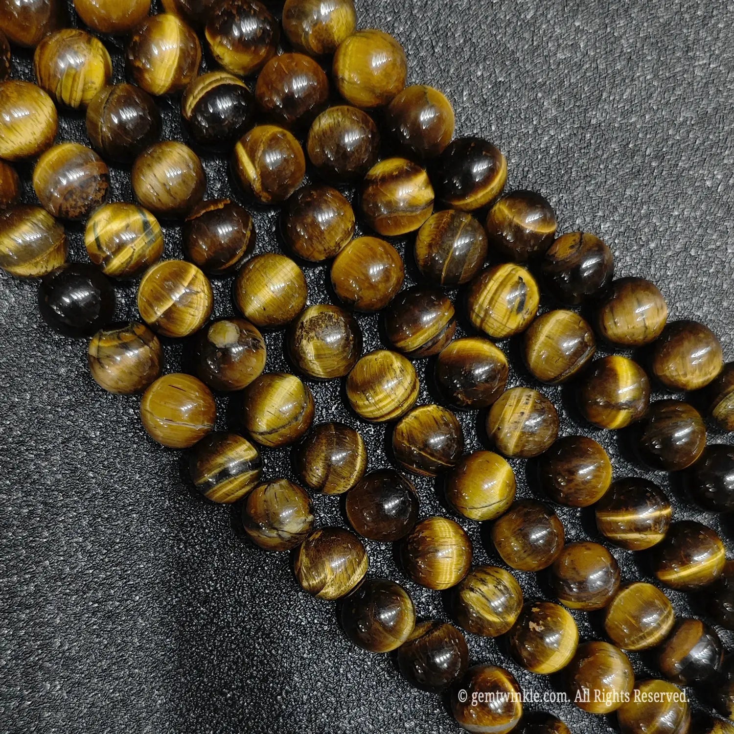 High angle view of wholesale earthy natural grade b minus tiger eye beads for rustic jewelry designers