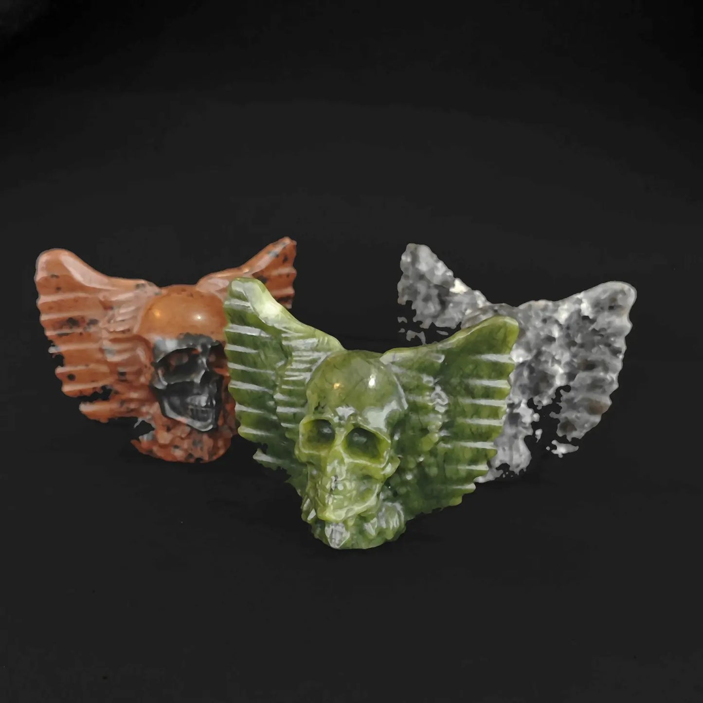 Serpentine, Red Obsidian and Grey Spotted Stone winged skull collection