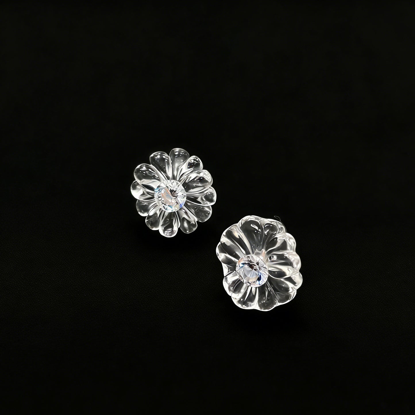 Woman Holding Natural White Crystal Flower Stud Earrings in Hand