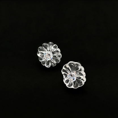 Woman Holding Natural White Crystal Flower Stud Earrings in Hand