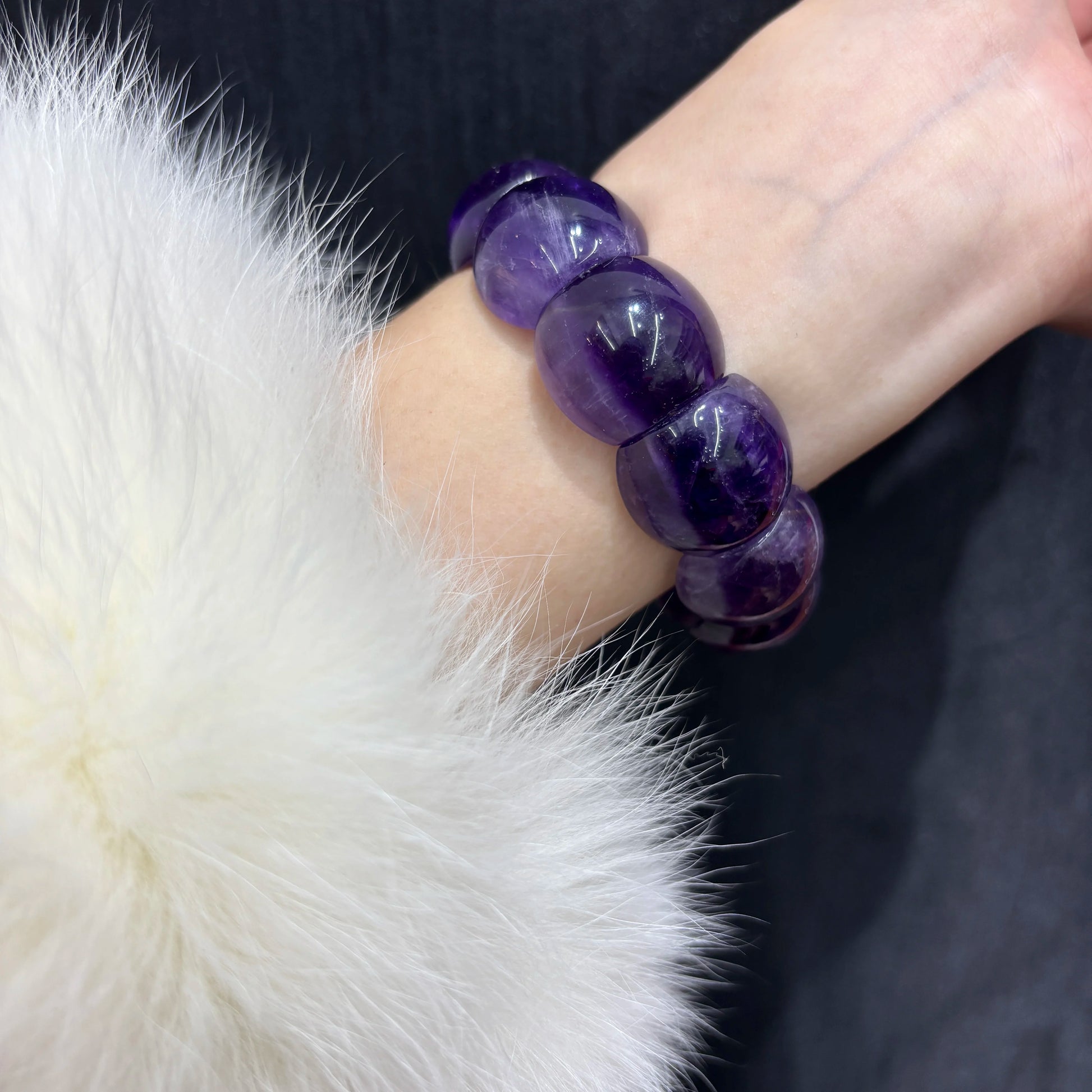 woman-wearing-amethyst-bangle-bracelet