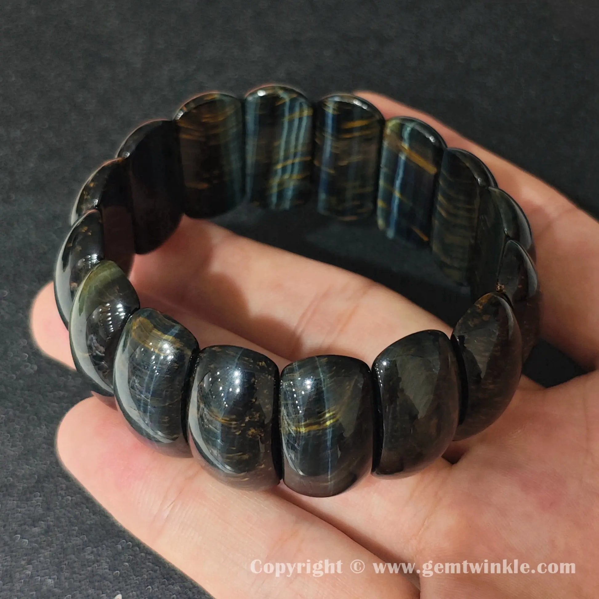 side profile view of machine polished yellow blue tigers eye crescent moon bead bracelet